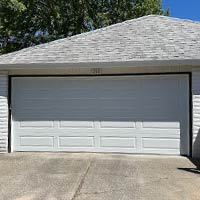 White garage door after repair